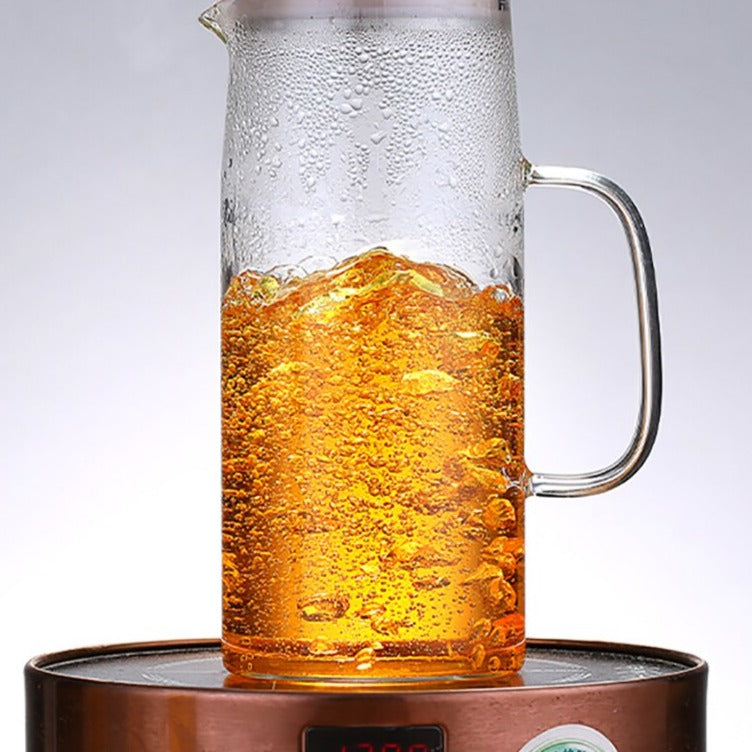 Glass iced tea pitcher with condensation, cold-brewed tea inside, fridge use