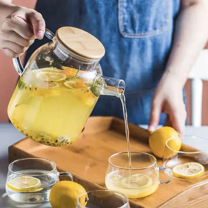 Borosilicate glass iced tea set with bamboo lid and matching cups