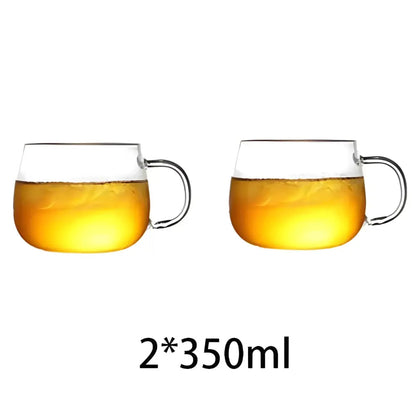 Two-cup glass iced tea set with bamboo lid poured into matching glasses