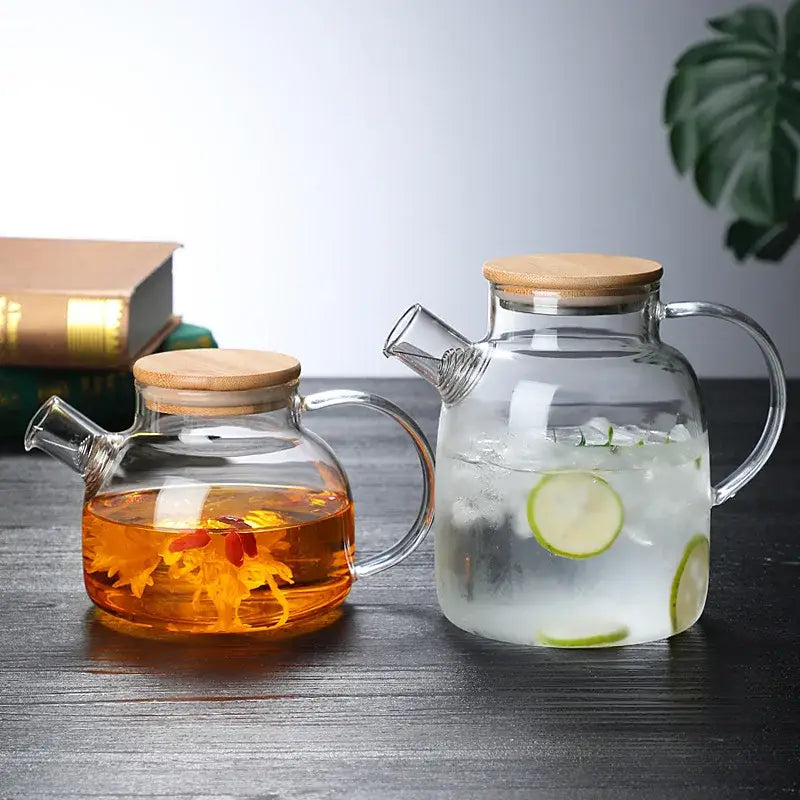 Glass iced tea set with bamboo lid and cups arranged for a summer serving