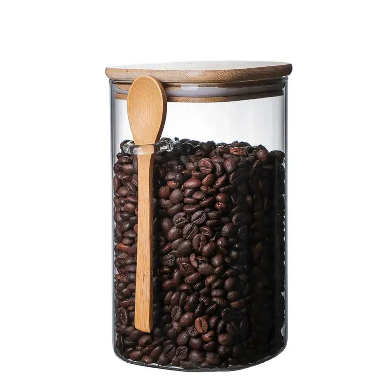Glass tea container with visible tea leaves inside