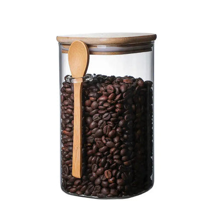 Glass tea container with visible tea leaves inside