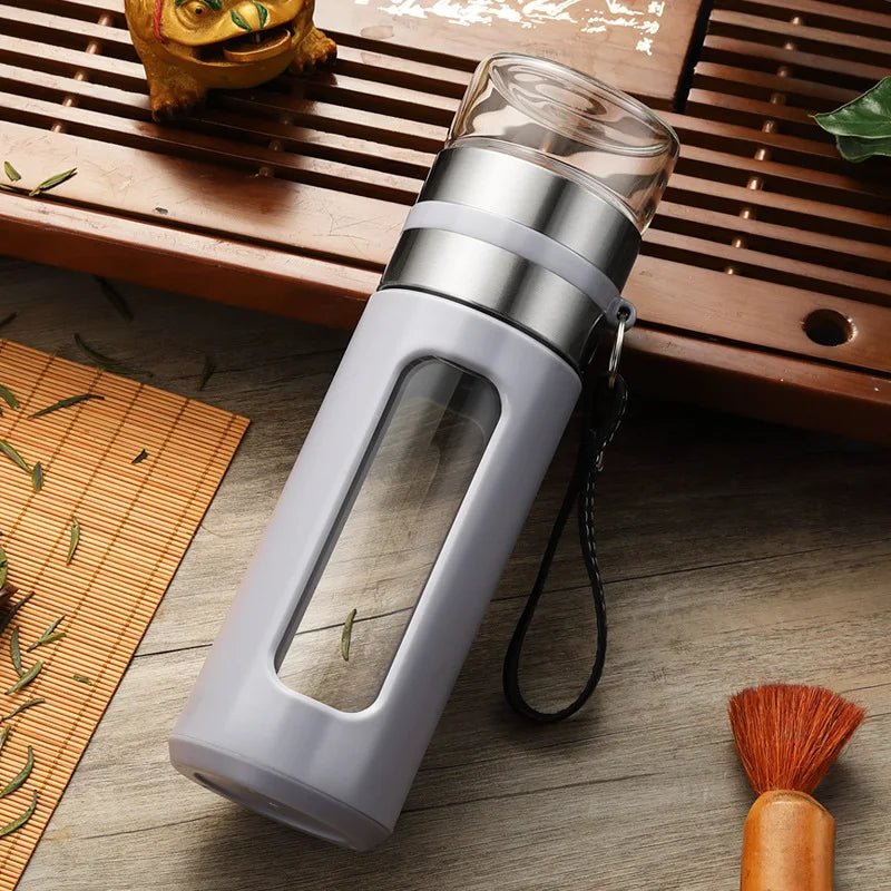 Portable glass tea infuser bottle 500ml with nylon carrying strap attached