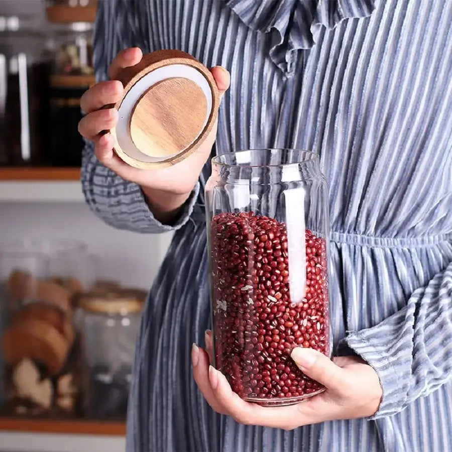 Close-up of airtight bamboo lid with silicone seal on glass tea canister