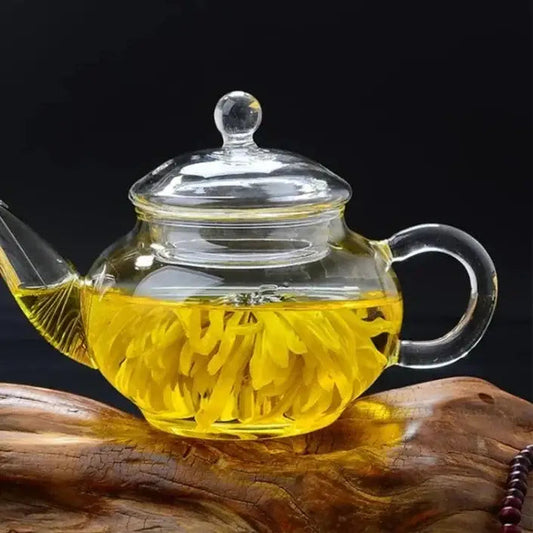 Clear glass teapot 250ml with glass lid, front view showing infuser