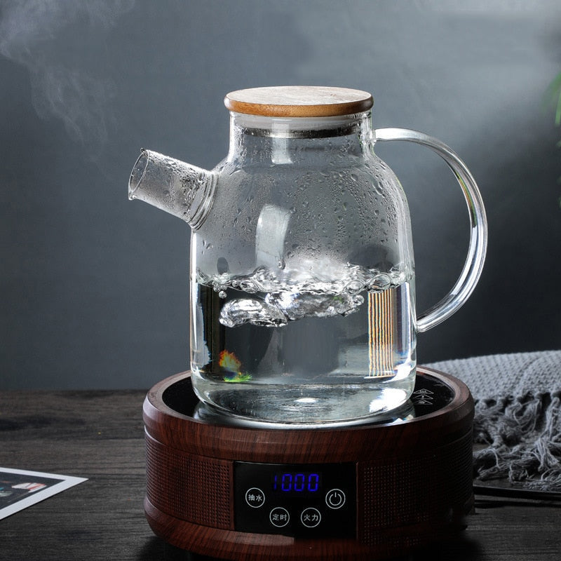 Elegant Scandinavian glass teapot with blooming tea, clean minimal styling