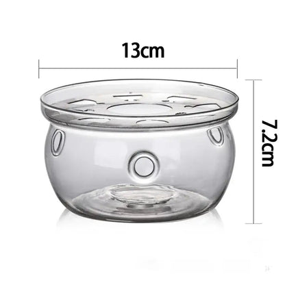 Glass teapot warmer with tea light candle, side view