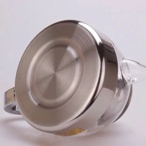 Elegant glass teapot with lid, perfect for tea lovers