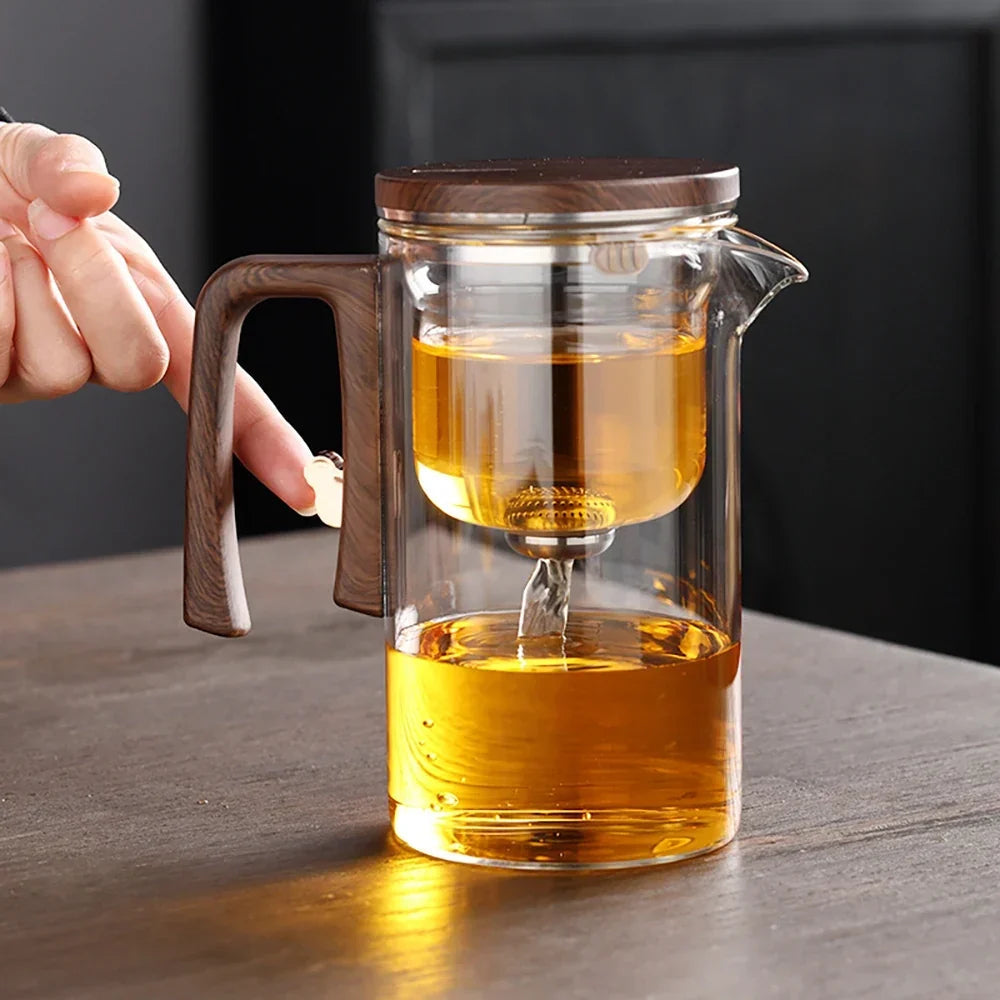 Glass teapot with magnetic infuser, wood handle detail and clear glass body