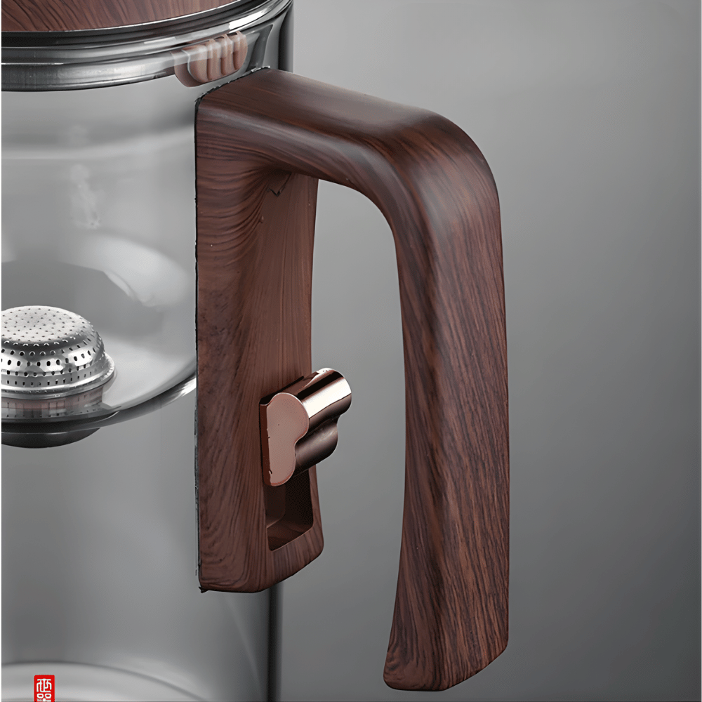 Glass teapot with magnetic infuser shown with matching cup set, 720ml version