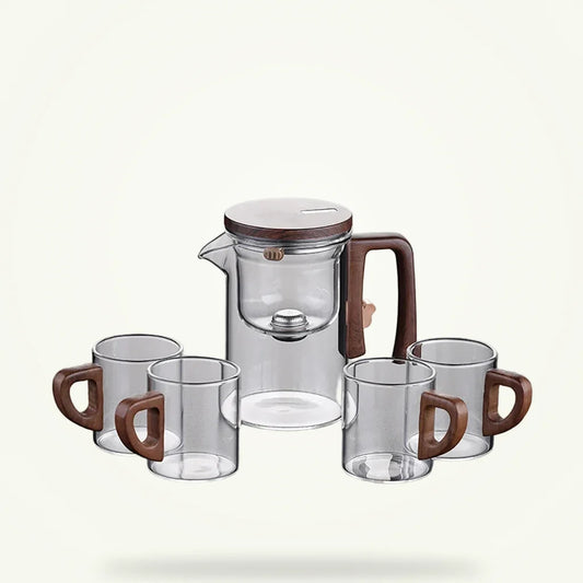 Glass teapot with magnetic infuser and wood handle, full product view on neutral background