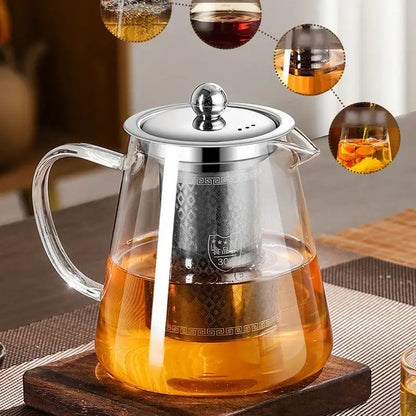 Clear glass teapot with tea brewing inside