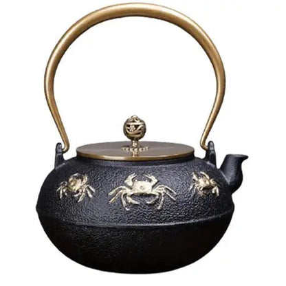 Golden crab cast iron teapot with black and gold enamel finish
