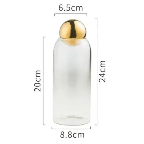 Large golden glass tea canister with lid, front view showing full size