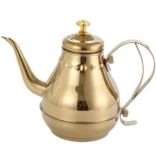 Golden oriental stainless steel teapot 1.2 liter on white background