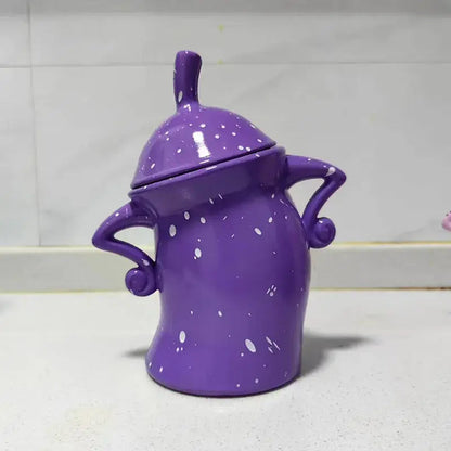 Purple Granny Lulu tea bag storage box, hands-on-hips character