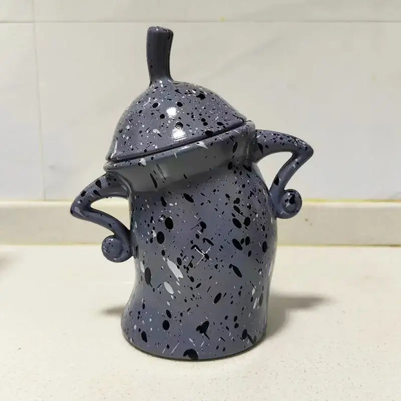 Gray tea bag storage box for kitchen organization, front view