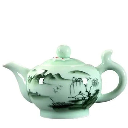 Green Chinese porcelain teapot with mountain design