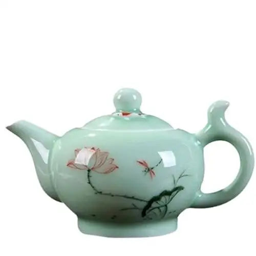 Green porcelain teapot with lotus pattern