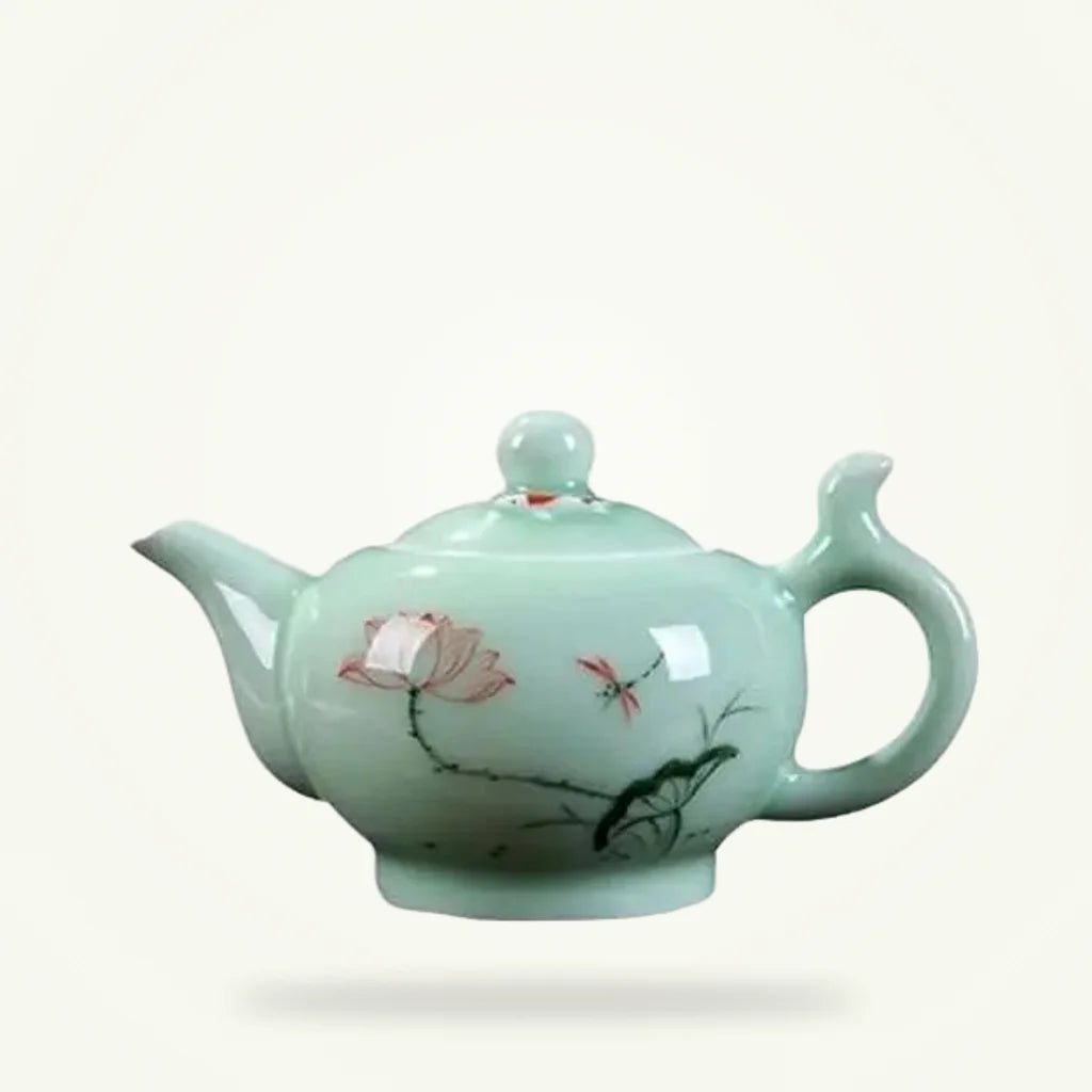 Green Chinese Porcelain Teapot with Mountain or Lotus Design, product photo on a plain background