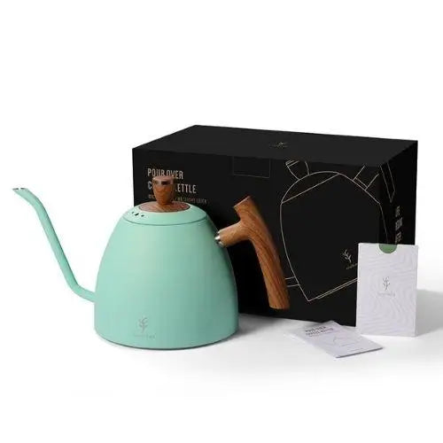 Full side view of the green gooseneck tea kettle with lid