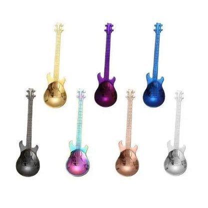 Guitar tea spoons with tea cup and leaves