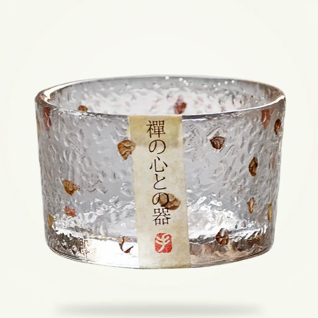 Hammered Glass Tea Cup with Gold Rim, product photo on a plain background