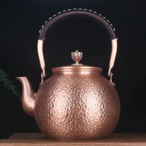 Hand-forged copper tea kettle antique style, round belly with tapered spout