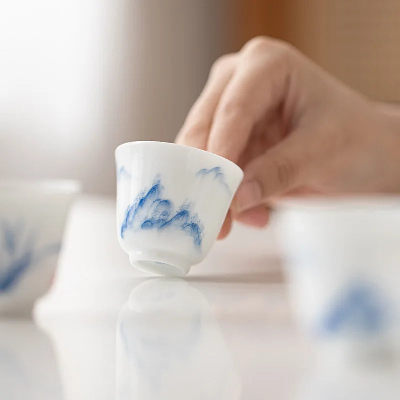 Hand-Painted White Porcelain Tea Cup - view 2