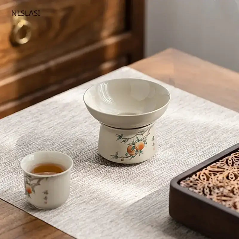 Handmade porcelain tea strainer with tea leaves