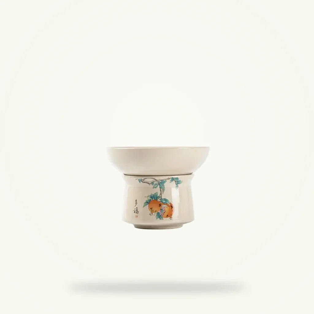 Handmade Blue and White Ceramic Tea Strainer for Loose Leaf Tea, product photo on a plain background