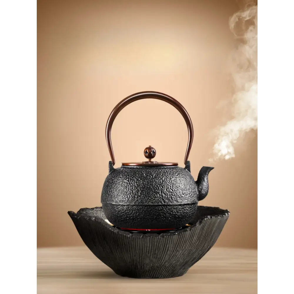 Handmade cast iron teapot 1.5L, full silhouette showing textured surface and curved spout