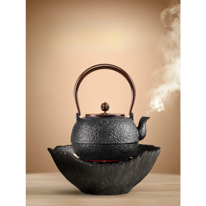 Handmade cast iron teapot 1.5L, full silhouette showing textured surface and curved spout