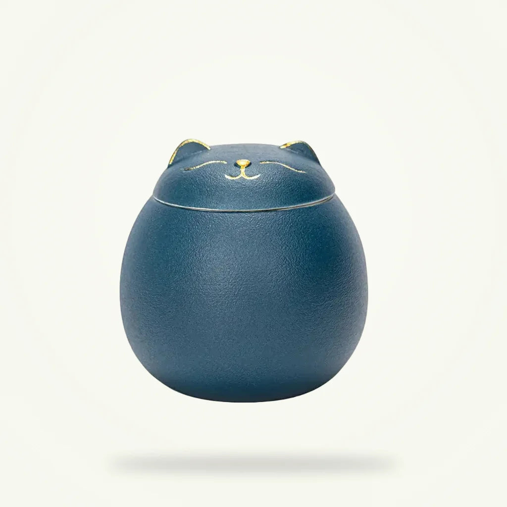 Handmade ceramic cat tea canister full product view on neutral background