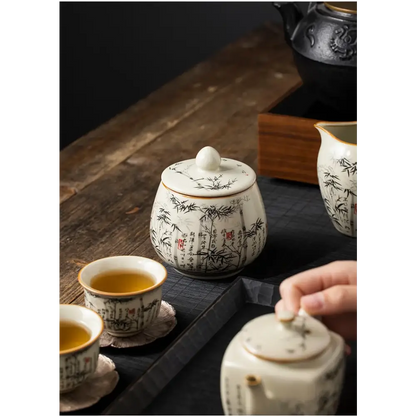 Ceramic loose leaf tea storage jar with snug bamboo lid, side profile view