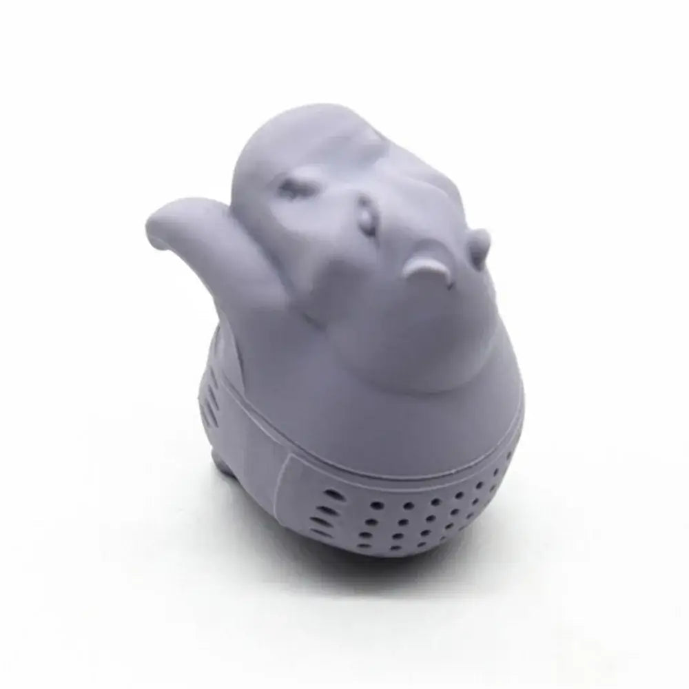 Hippo tea infuser steeping in a glass teapot