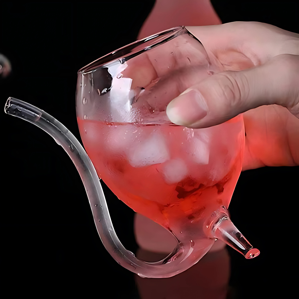 Pair of iced tea glasses with straws on a table