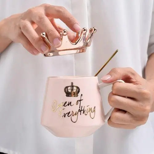 Person using imperial crown teacup with lid