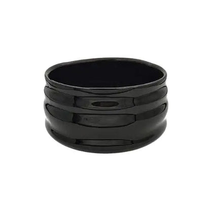 Japanese black chawan matcha bowl on wooden table