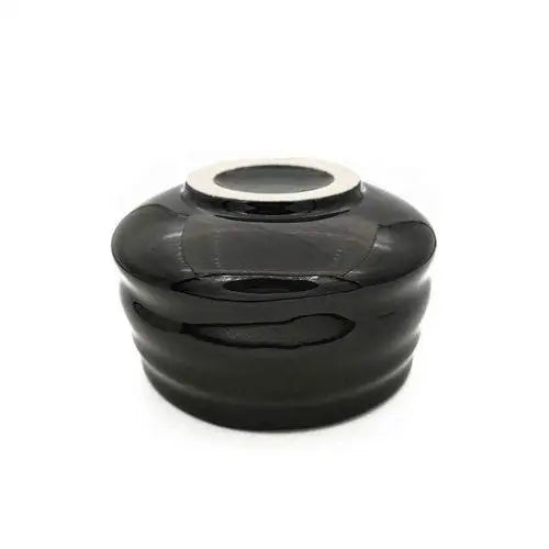 Bottom of Japanese black chawan showing ceramic texture