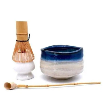 Japanese chawan tea bowl with a bamboo whisk and tea scoop