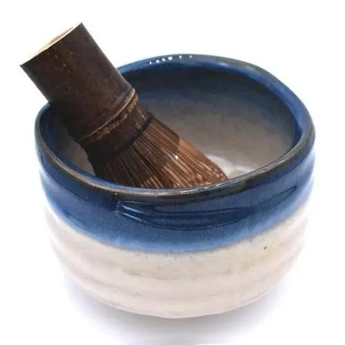 Handcrafted chawan bowl with matcha whisk and powder