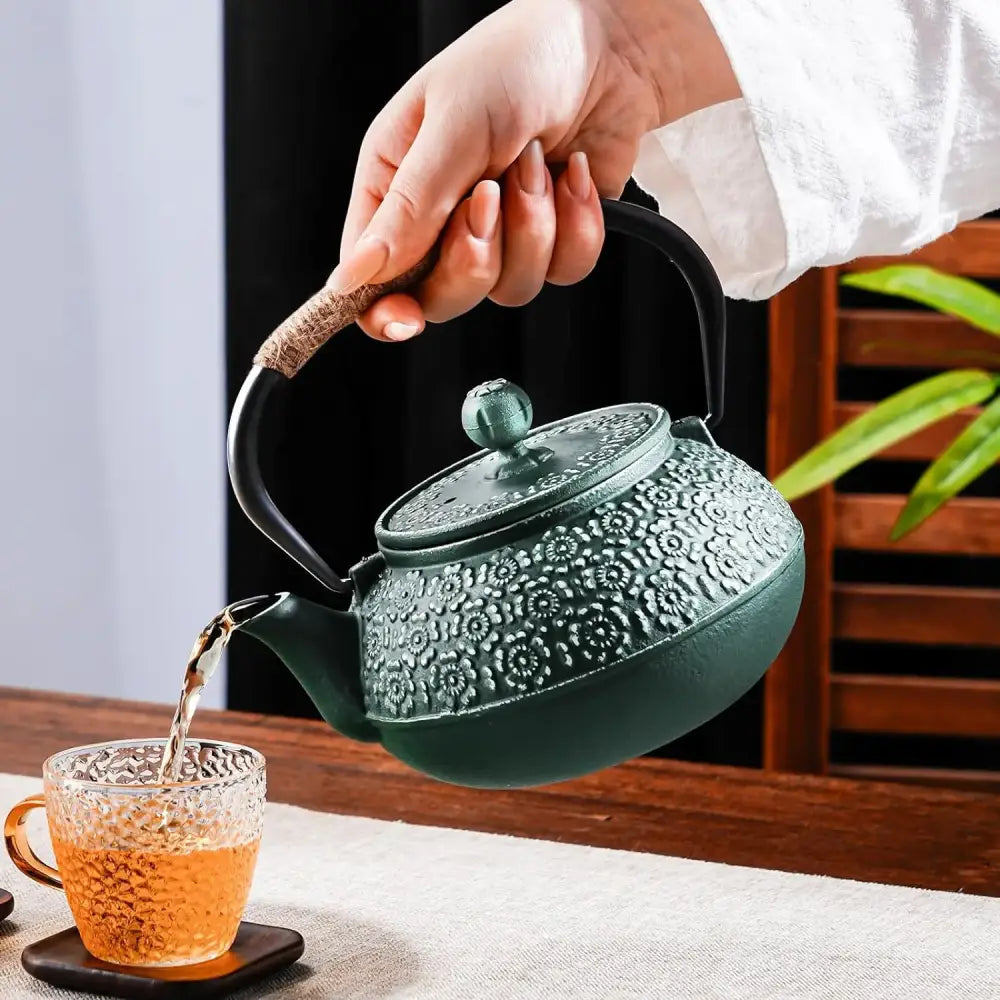 Japanese cast iron teapot with sakura blossom relief design, olive green finish, 800 ml