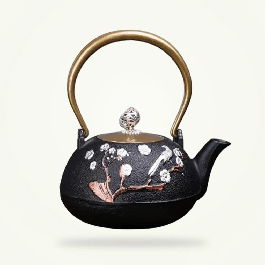 Japanese Cast Iron Teapot with Cherry Blossom Design - 1200 ml, product photo on a plain background