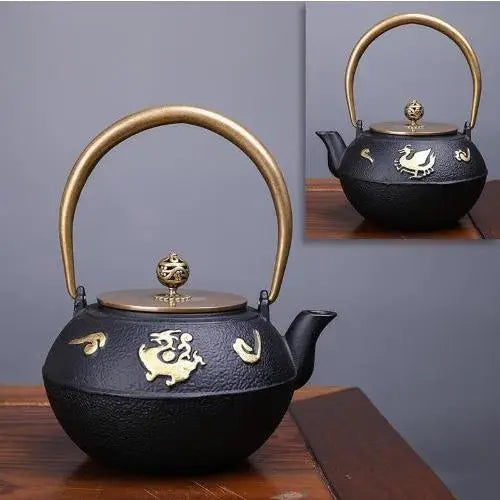 Cast iron teapot with dragon motif, black and gold