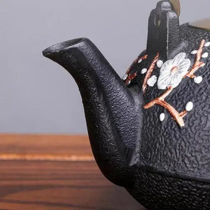 Japanese teapot in cast iron with floral motif