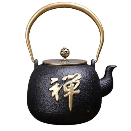 Japanese cast iron teapot with black and gold kanji design