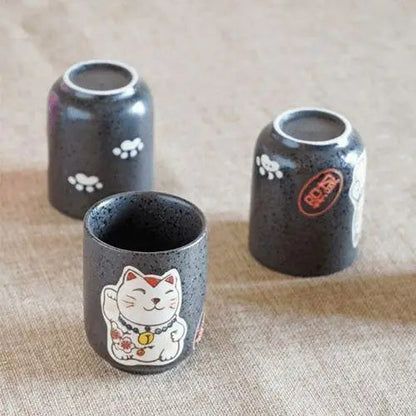 Porcelain cat teapot with matching cups