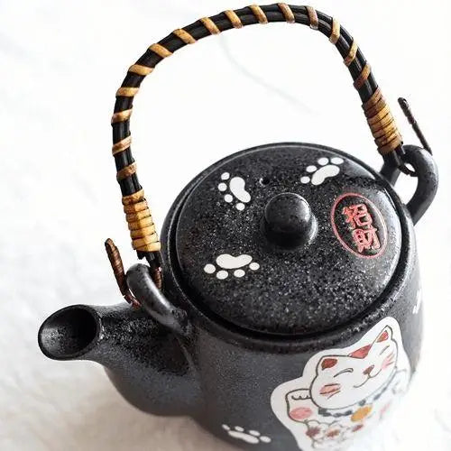 Cat teapot set display on table