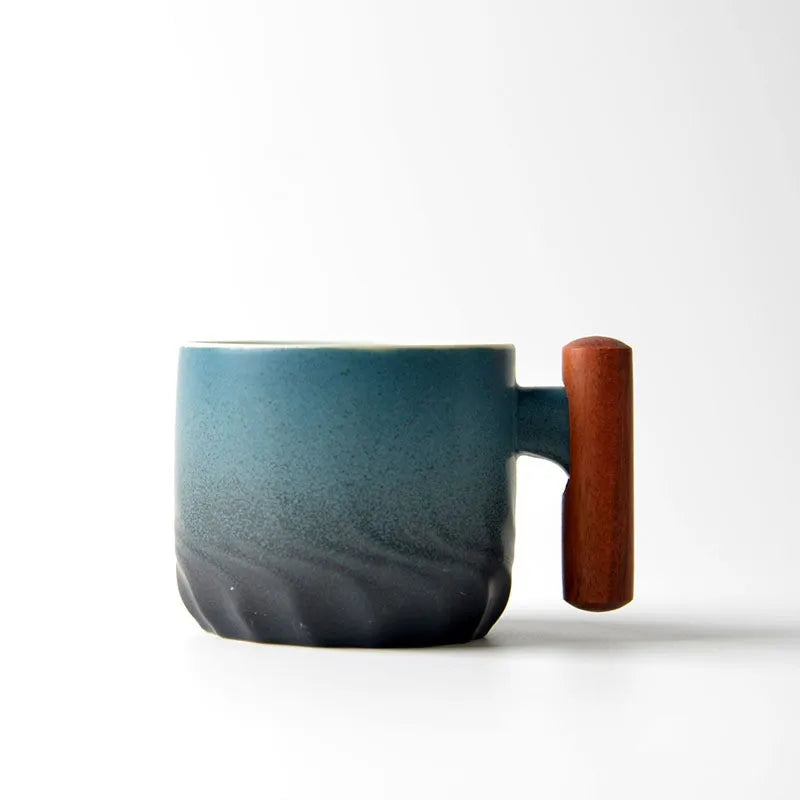 Japanese ceramic tea cup with wooden handle shown in all four colors: black, green, white, blue